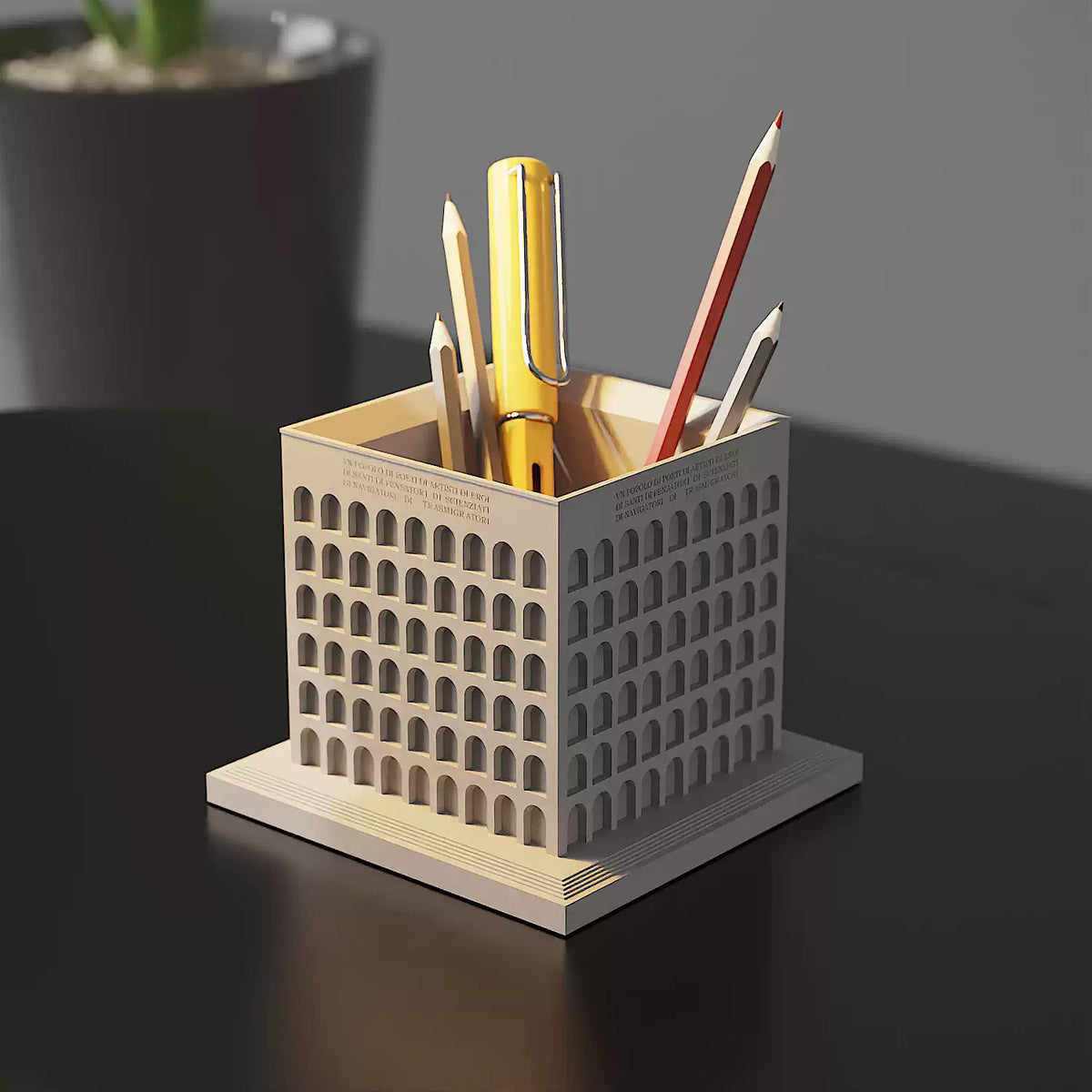 Angled view of the Square Colosseum pen holder with rows of arches on two faces.