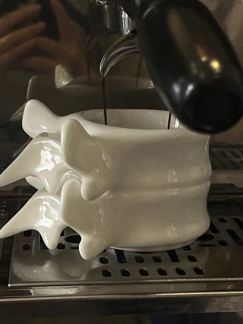 Spine Cup used for coffee on a table