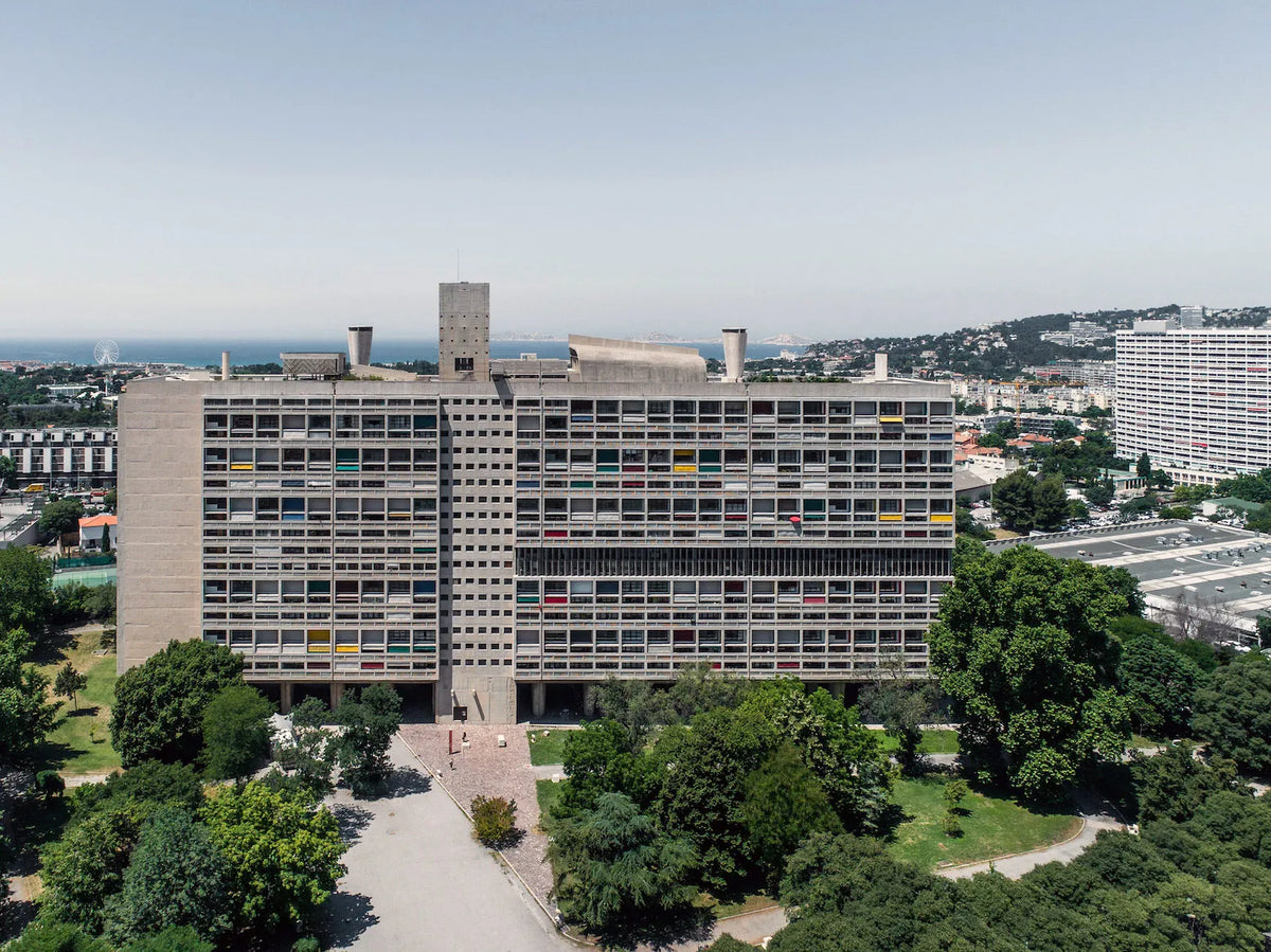 Real Unité d’Habitation in Marseille, photographed by Denis Esakov, showing the full building and surrounding landscape.